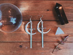 Moon & Sword Earrings - silver plated crescent moon + long blade dangle earrings
